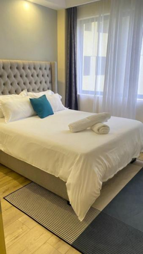 classy elegant apartment with heated swimming pool,fully equipped gym private parking space and amazing city views